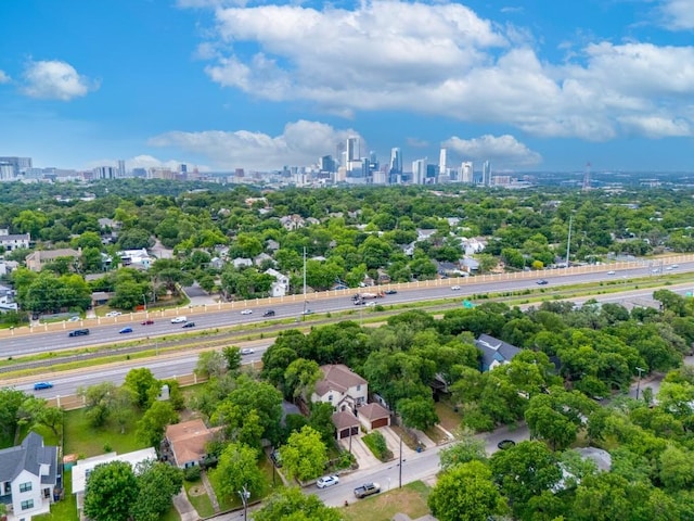 1907 Winsted Ln Unit 1, Austin, TX 78703 - drone / aerial view of a tree filled landscape, a highway, and city skyline