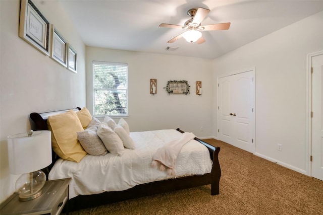 carpeted bedroom with baseboards and ceiling fan
