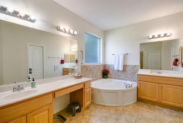 bathroom with a garden tub, tile patterned floors, two vanities, and a stall shower