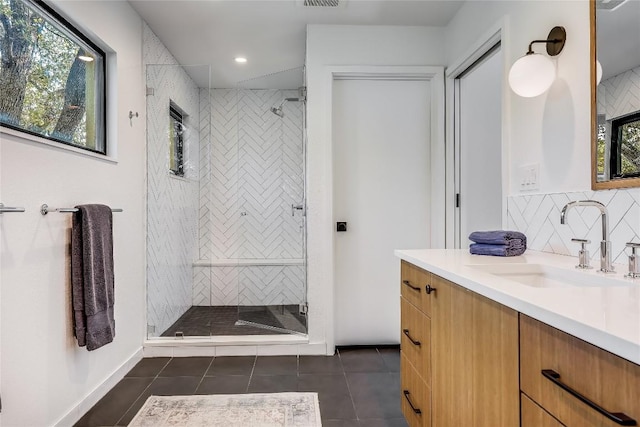 full bathroom with tile patterned floors, a shower stall, vanity, recessed lighting, and decorative backsplash