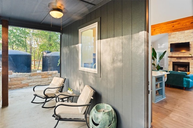 146 Caldwell Ranch Rd, Cedar Creek, TX 78612 - view of patio / terrace featuring a fireplace and ceiling fan