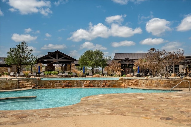 6108 Antelope Well Ln, Austin, TX 78738 - community pool featuring a patio area