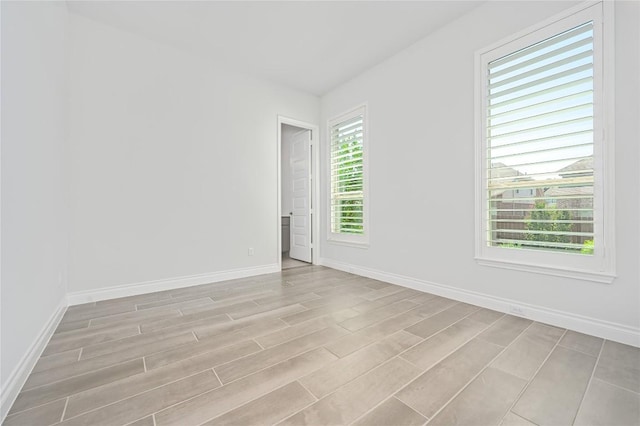 6108 Antelope Well Ln, Austin, TX 78738 - spare room with light wood-style flooring and baseboards