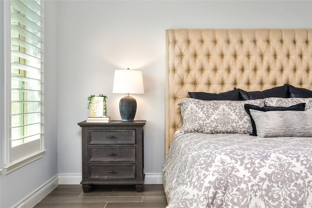 6108 Antelope Well Ln, Austin, TX 78738 - bedroom with baseboards and wood finished floors