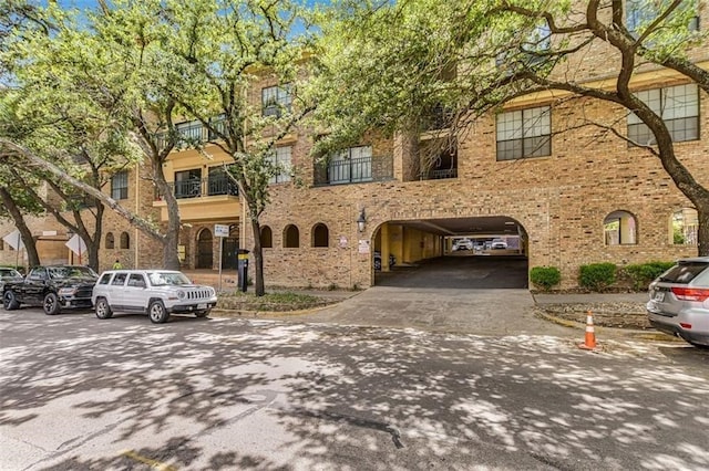 1908 San Antonio St Unit 213, Austin, TX 78705 - townhome / multi-family property featuring brick siding