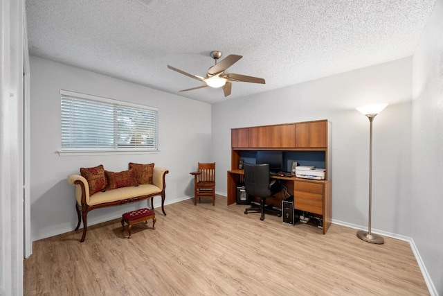 4210 Harcourt Dr, Austin, TX 78727 - office area featuring a ceiling fan, light wood-type flooring, a textured ceiling, and baseboards