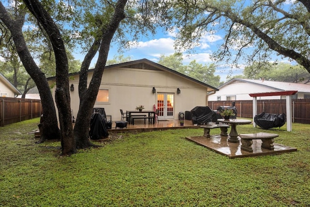 4210 Harcourt Dr, Austin, TX 78727 - back of house featuring french doors, a patio area, and stucco siding