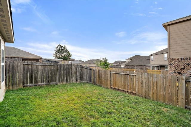 view of yard featuring a residential view