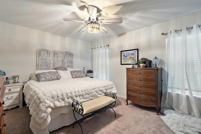 bedroom with carpet and a ceiling fan