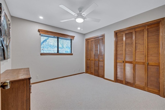 10804 Buckthorn Dr, Austin, TX 78759 - unfurnished bedroom with multiple closets, carpet floors, ceiling fan, and recessed lighting