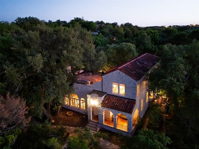 806 Rosedale Ter, Austin, TX 78704 - rear view of property featuring a forest view and stone siding
