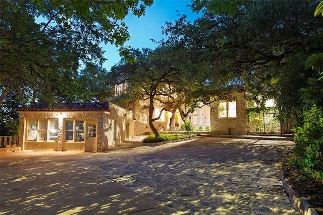 806 Rosedale Ter, Austin, TX 78704 - view of front of property with driveway and stone siding