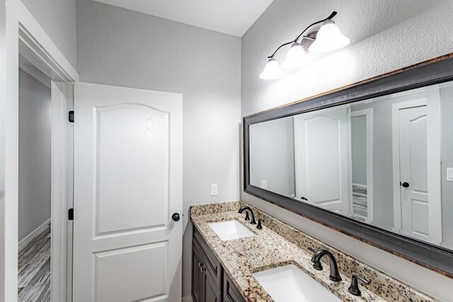 121 Grassy Ln, Elgin, TX 78621 - bathroom with double vanity