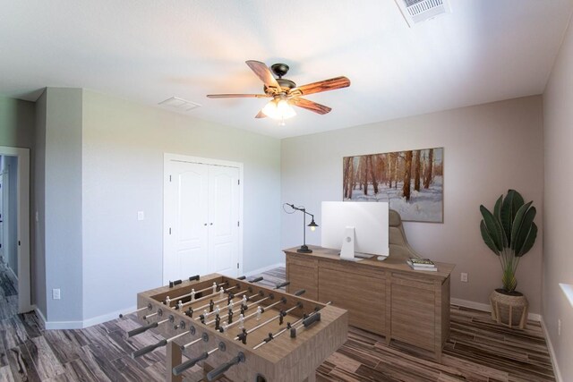 121 Grassy Ln, Elgin, TX 78621 - playroom with wood finished floors and ceiling fan