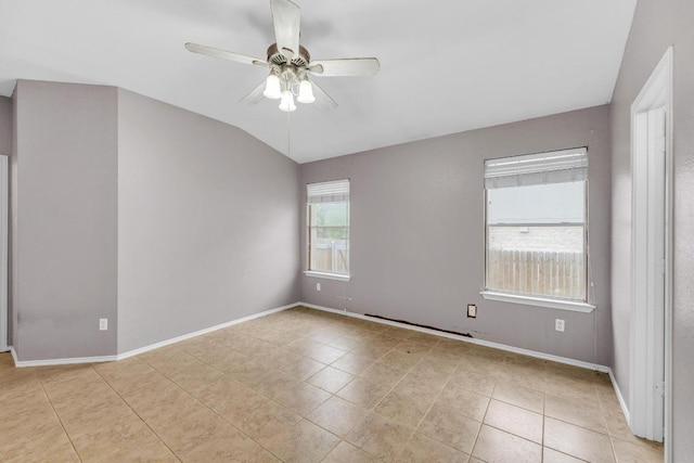 906 Mammoth Ct, Round Rock, TX 78681 - spare room featuring a ceiling fan, lofted ceiling, baseboards, and light tile patterned flooring