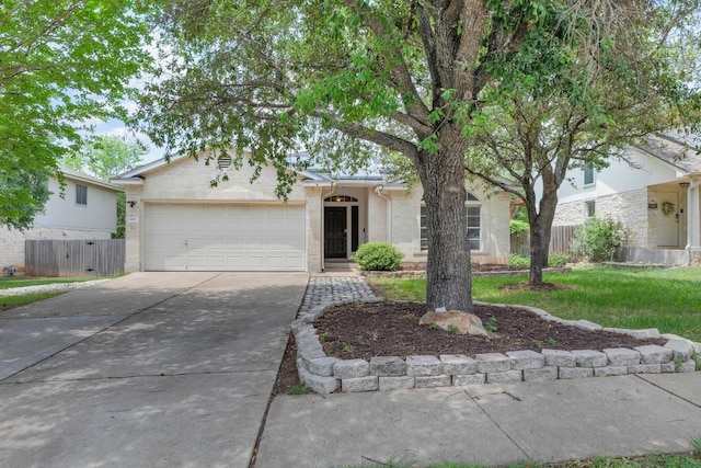 906 Mammoth Ct, Round Rock, TX 78681 - ranch-style home with driveway, an attached garage, and brick siding