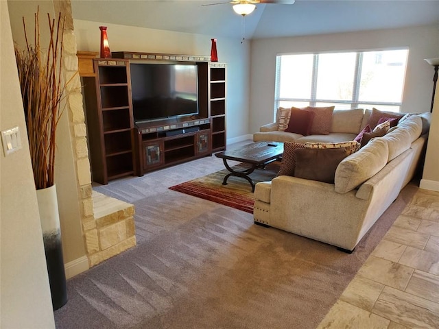 539 Tanda Ln, Hutto, TX 78634 - living room featuring baseboards, a ceiling fan, and lofted ceiling
