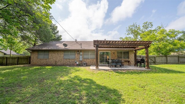 back of house featuring a pergola, a patio, and brick siding