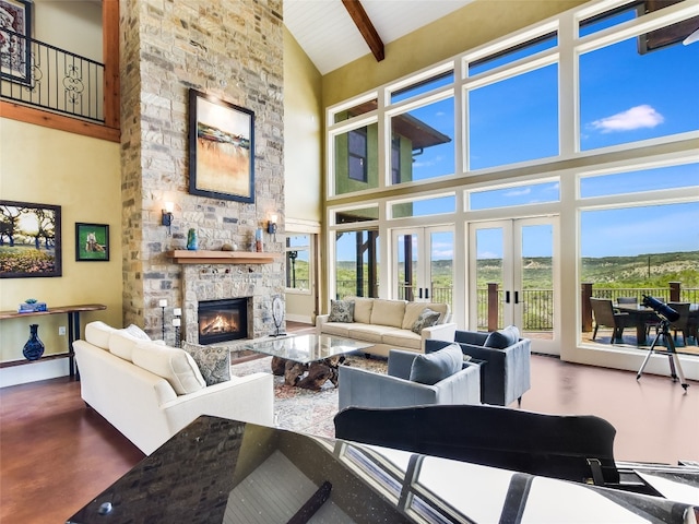 400 Hillview Rd, Wimberley, TX 78676 - living room with high vaulted ceiling, a fireplace, and beamed ceiling