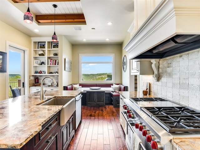 400 Hillview Rd, Wimberley, TX 78676 - kitchen featuring custom exhaust hood, stainless steel appliances, a sink, dark wood finished floors, and light stone countertops