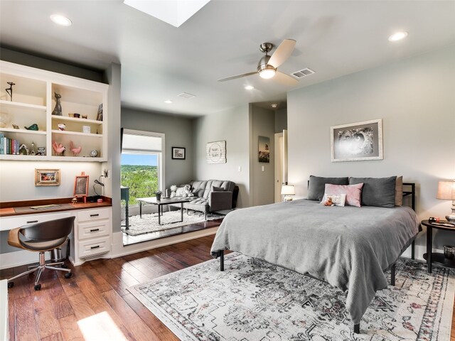 400 Hillview Rd, Wimberley, TX 78676 - bedroom with dark wood-style floors, a skylight, recessed lighting, and a ceiling fan