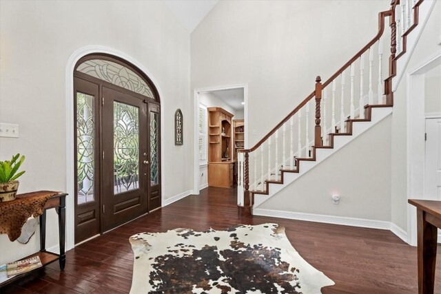 1016 High Hill Creek Rd, La Grange, TX 78945 - foyer entrance featuring hardwood / wood-style flooring, baseboards, stairs, and high vaulted ceiling