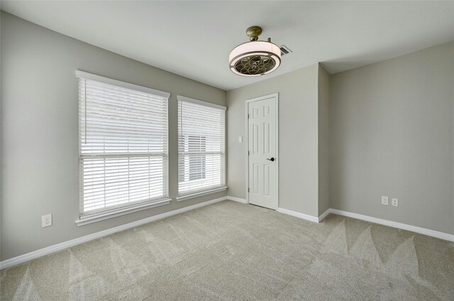 4933 China Garden Dr, Austin, TX 78730 - carpeted spare room with baseboards