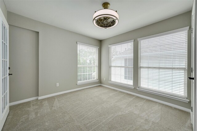 4933 China Garden Dr, Austin, TX 78730 - carpeted spare room with baseboards