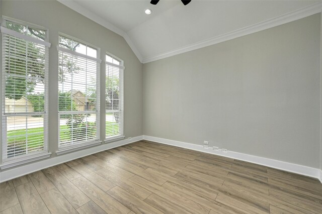 4933 China Garden Dr, Austin, TX 78730 - empty room featuring a ceiling fan, crown molding, baseboards, lofted ceiling, and wood finished floors