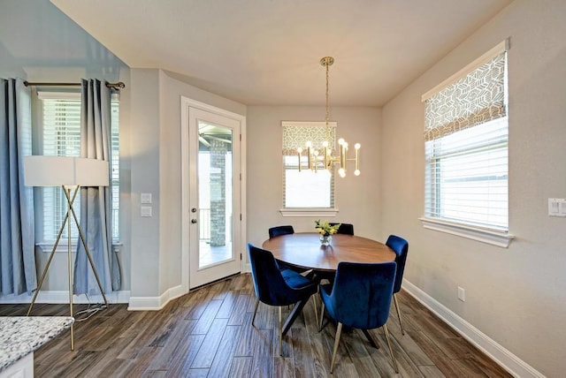1816 Ficuzza Way, Leander, TX 78641 - dining room featuring dark wood-type flooring and a chandelier