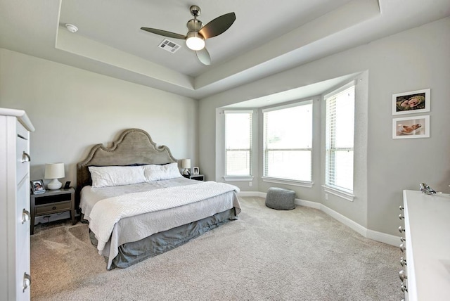 1816 Ficuzza Way, Leander, TX 78641 - bedroom with carpet floors, a tray ceiling, and ceiling fan