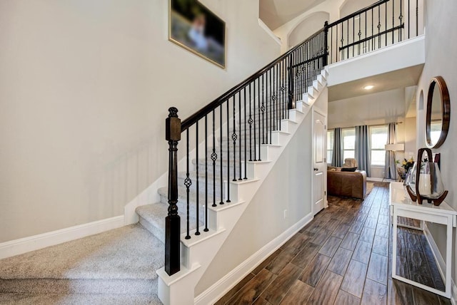 1816 Ficuzza Way, Leander, TX 78641 - stairway with wood finish floors and a towering ceiling