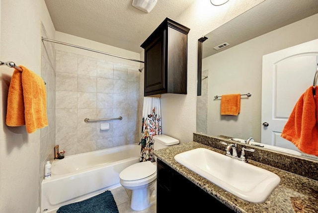 1816 Ficuzza Way, Leander, TX 78641 - full bathroom featuring vanity, shower / tub combo, tile patterned floors, and a textured ceiling