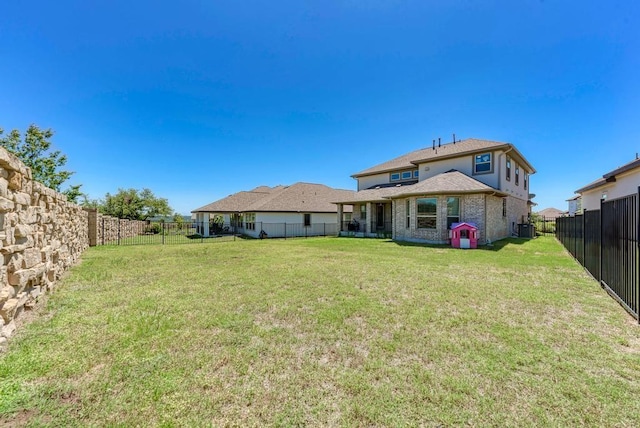 1816 Ficuzza Way, Leander, TX 78641 - rear view of property with a fenced backyard