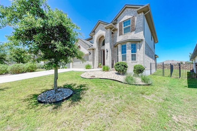 1816 Ficuzza Way, Leander, TX 78641 - view of front of home with a garage, brick siding, and concrete driveway