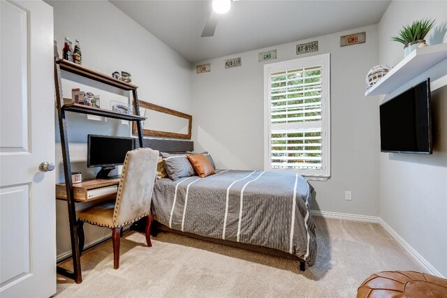 bedroom with carpet, baseboards, and ceiling fan