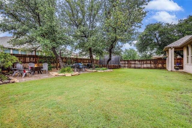 view of yard featuring a patio and a trampoline