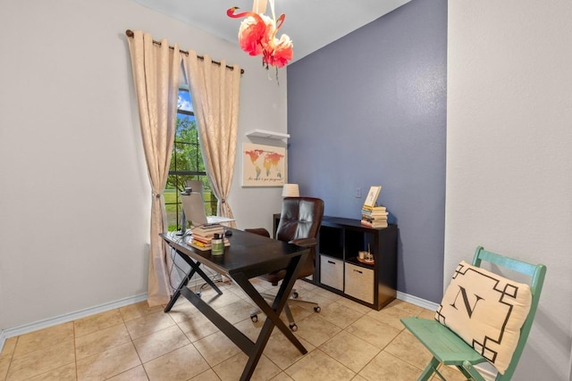 office with baseboards and tile patterned floors