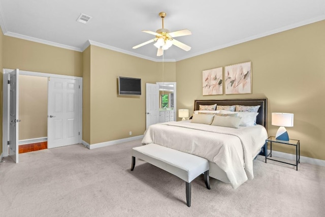 bedroom featuring carpet floors, ornamental molding, baseboards, and ceiling fan