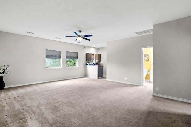 8900 Bell Mountain Dr, Austin, TX 78730 - unfurnished living room featuring ceiling fan and light carpet