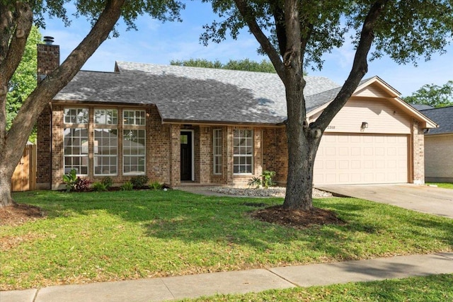 2310 Raintree Path, Round Rock, TX 78664 - view of front of property with brick siding, a garage, a chimney, driveway, and a front yard