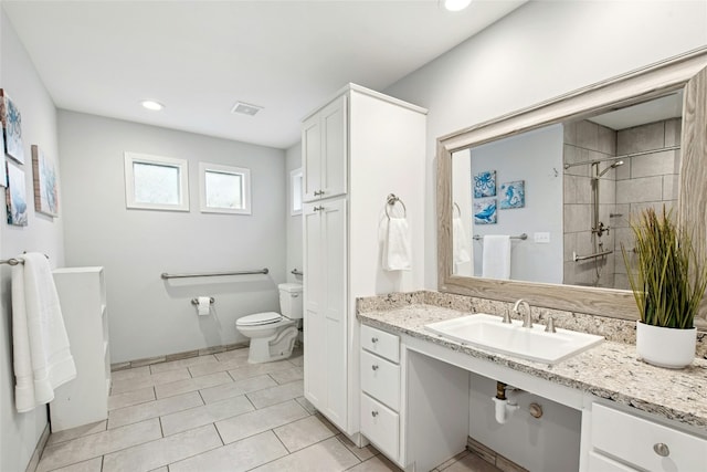 2627 Oak Meadow Dr, Round Rock, TX 78681 - bathroom featuring toilet, vanity, tile patterned floors, and recessed lighting