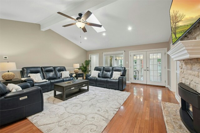 2627 Oak Meadow Dr, Round Rock, TX 78681 - living room with ceiling fan, french doors, beam ceiling, hardwood / wood-style flooring, and high vaulted ceiling