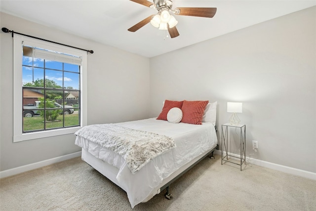2627 Oak Meadow Dr, Round Rock, TX 78681 - carpeted bedroom with baseboards and ceiling fan