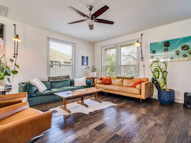 604 Allen St Unit 103, Austin, TX 78702 - living area featuring wood finished floors, a ceiling fan, and plenty of natural light