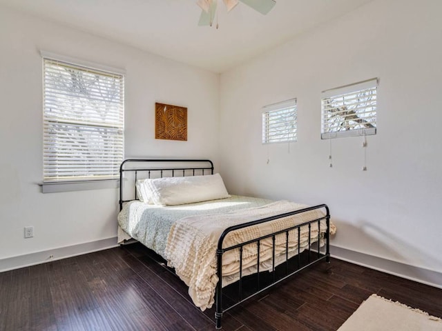 604 Allen St Unit 103, Austin, TX 78702 - bedroom featuring wood finished floors, ceiling fan, and baseboards