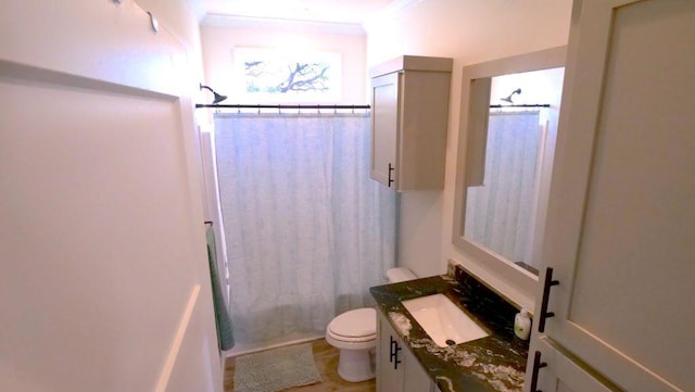 bathroom with toilet, vanity, and shower / tub combo with curtain