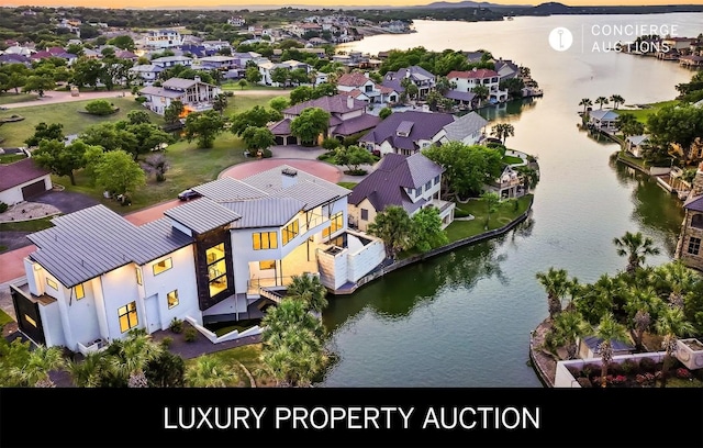 81 Applehead Island Dr, Horseshoe Bay, TX 78657 - aerial perspective of suburban area with a nearby body of water