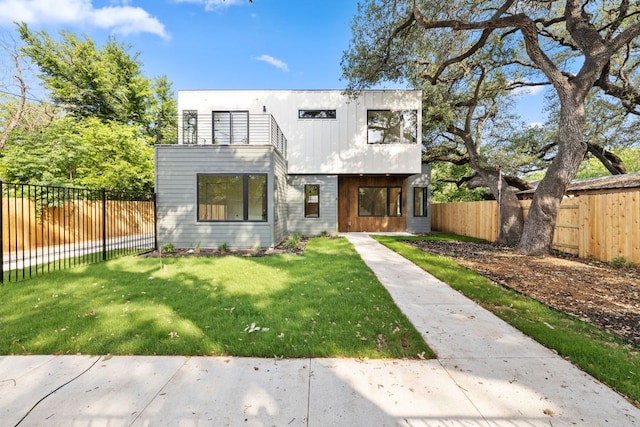 4407 Merle Dr Unit A, Austin, TX 78745 - contemporary home featuring a fenced backyard