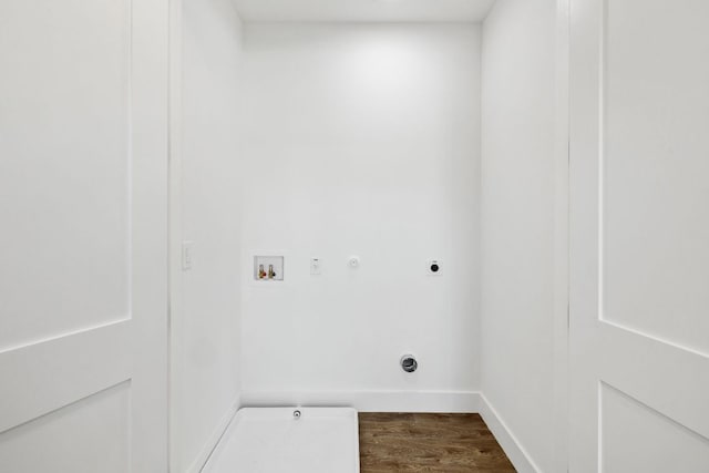 4407 Merle Dr Unit A, Austin, TX 78745 - laundry area with electric dryer hookup, gas dryer hookup, washer hookup, and dark wood-style floors